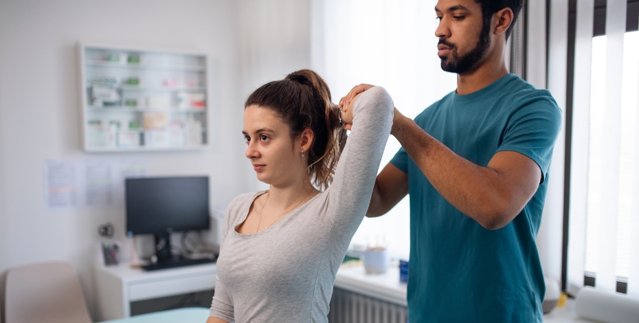 physiotherapist working on a patient