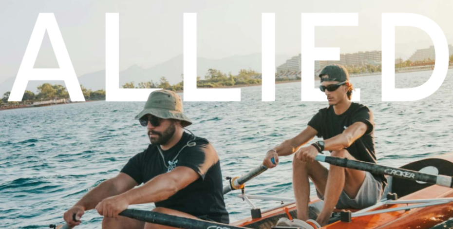 two males in a canoe