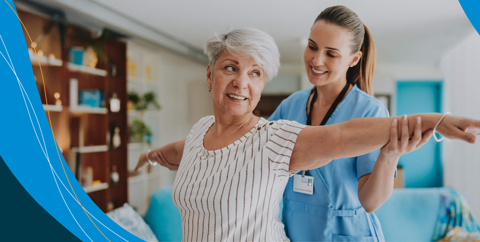 a physiotherapist assists an elderly patient with an arm exercise in a studio