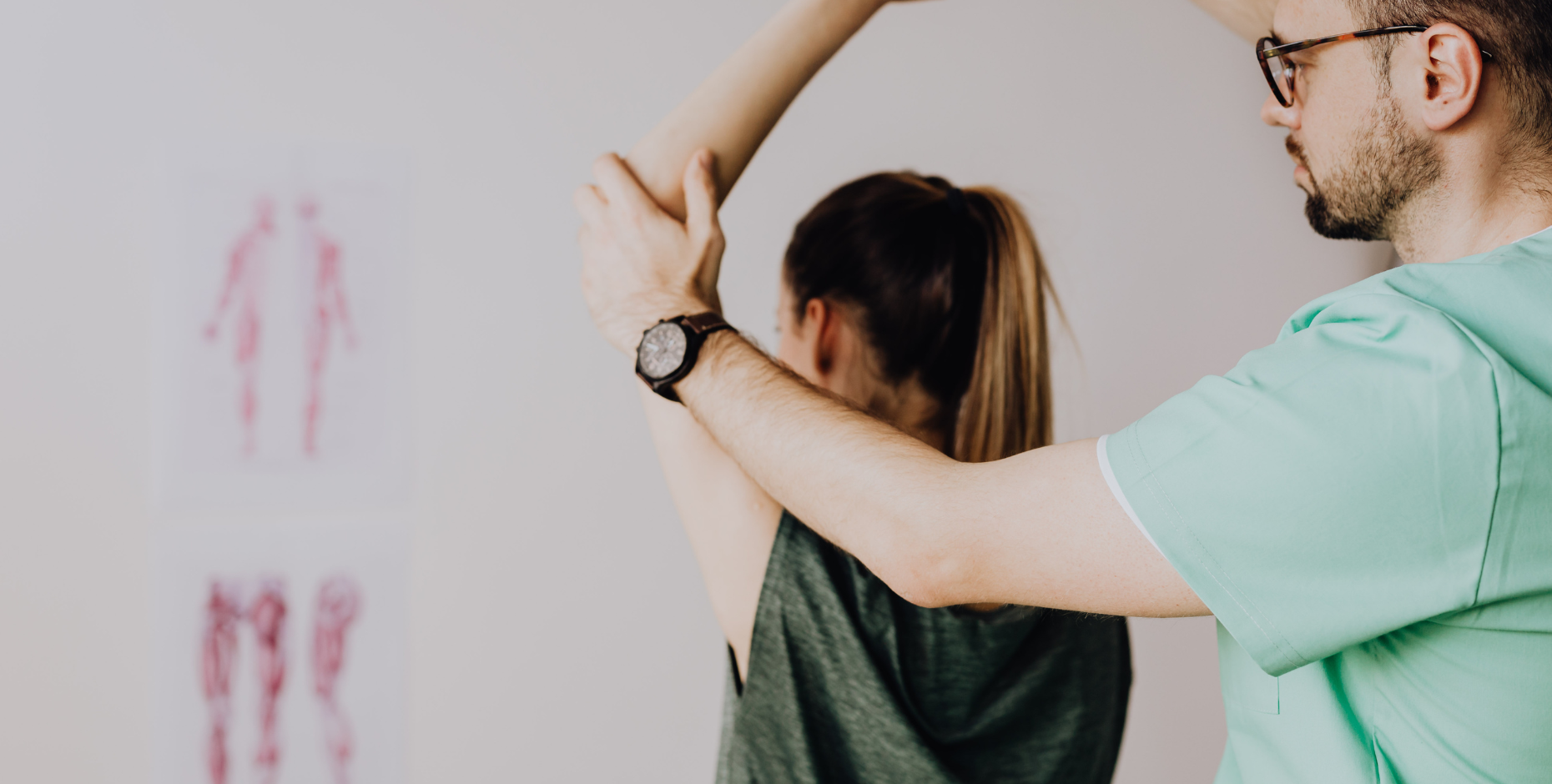 Athlete's shoulder being treated by a physiotherapist